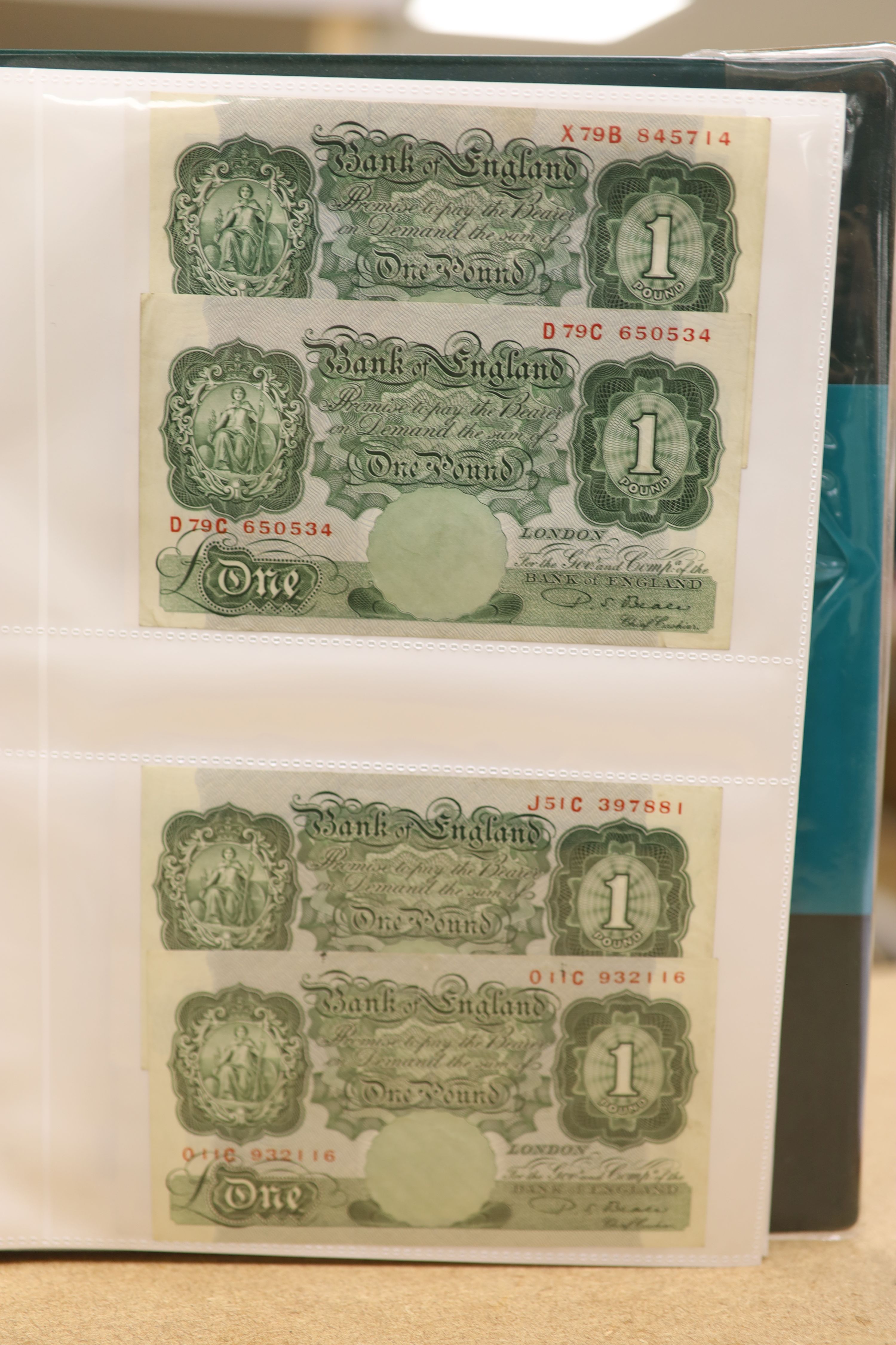 A collection of Bank of England and Scottish banknotes to include: 21 QEII 10 shillings, 14 O'Brien and Beale 10 shillings, 1 Peppiatt 10 shillings, 4 Hallam one pound notes, 18 O'Brien or Beale one pound notes, 8 Peppia